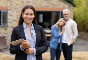 Realtor building relationship with couple